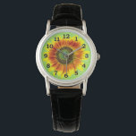 Solrosfeta Blommigtar Gult och Grönt blomma Armbandsur<br><div class="desc">Den här söta sommardesignen har en fetstilt solrosliknande blommar i fullt. Den är gjord i skuggor av ljus gult, levande orange och brun och grönt på en något utfattig/grym bakgrund av den kalla grönten. Den stora blomman har ett målat utseende. Om du använder trädgårdar och blomstermotiv i kärlek kommer du...</div>