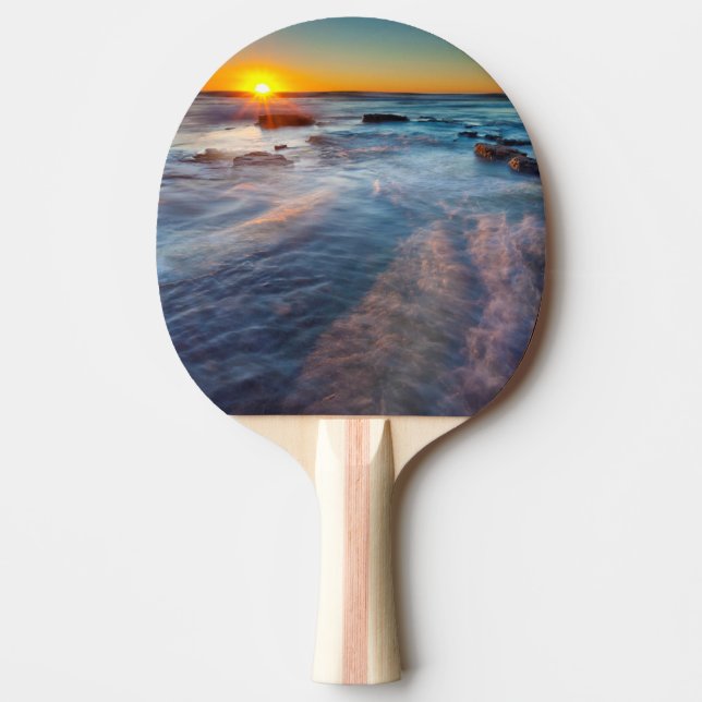 Solstrålar belyser Stilla havet Pingisracket (Framsidan)