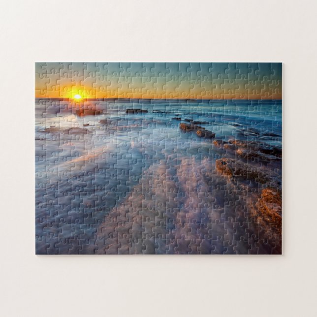 Solstrålar belyser Stilla havet Pussel (Horisontell)