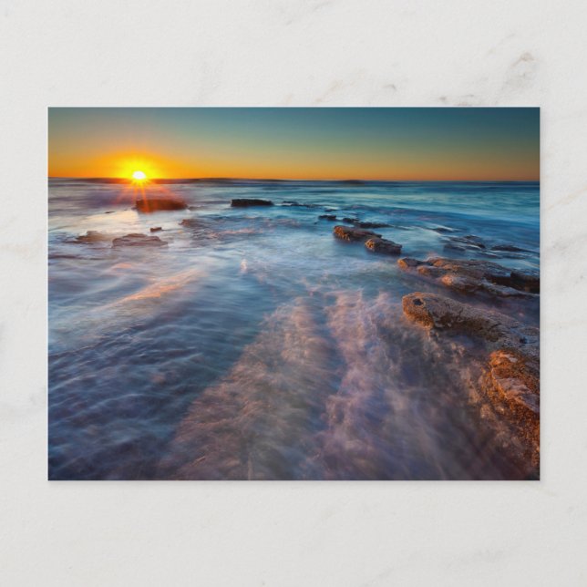 Solstrålar belyser Stilla havet Vykort (Framsida)