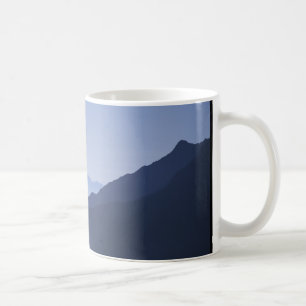 Soluppgång i alpernan kaffemugg