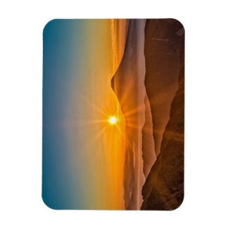 Soluppgång mellan backe magnet
