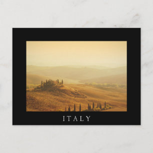 Soluppgång över ett landskap i Toscanas svarta vyk Vykort