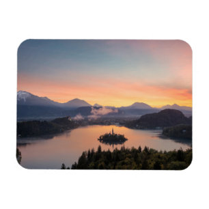 Soluppgången över sjön blödde den rektangulär magnet