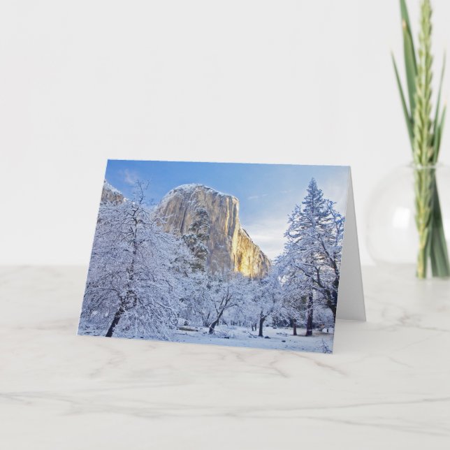 Soluppsljus träffar El Capitan genom snoweri Kort (Framsida)