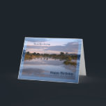 Som en son, Sjö på födelsedagskortet Kort<br><div class="desc">Ett kort för någon som är som en son. Ett vackert foto av sjö i gryningen med moln som reflekterar i vatten. Ett underbart sätt att önska någon ett Grattis på födelsedagen. Copyright Norma Cornes.</div>