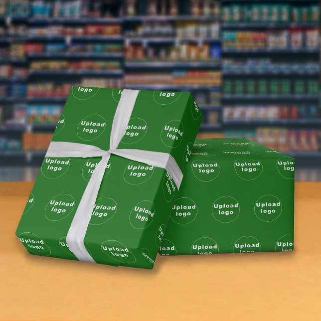 Sömlös Grönt för Logotyp av  - radbrytning Papper Presentpapper (Seamless pattern of your business logo on green wrapping paper.)