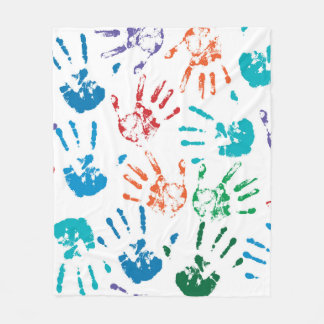 Sömlös mönster av flerfärgat händer på en  fleecefilt