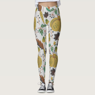 Sömlösa mönster av tropiska pumpor och morötter leggings