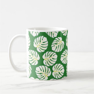 Sömlösa mönster i vita monstera löv på en dar kaffemugg