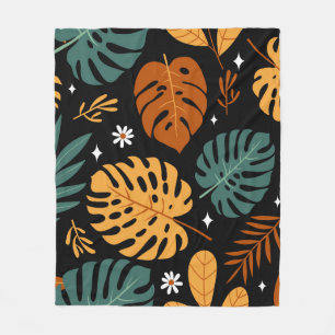 Sömlöst mönster med olika tropiska löv och fleecefilt