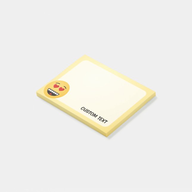 Sömmande Ansikte med hjärtformad Öga Post-it Block (Vinklad)