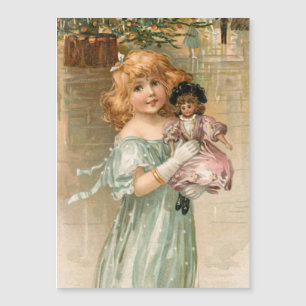 Sömmande Victorian Girl med Doll vid jul Boll
