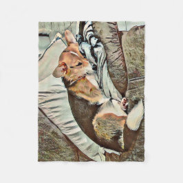 Sömmande Welsh Corgi på soffan Fleecefilt