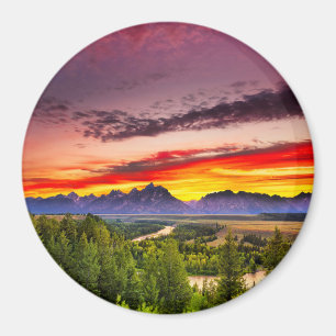 Sommarsolnedgången på Snake River förbiser Magnet