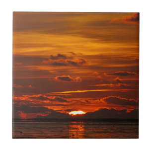 Sonnenuntergang am Meer Kakelplatta