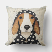 Sorglig beagle-valp i klänning med prickar