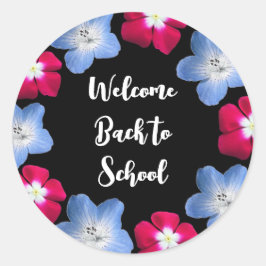 Sort svart färg och blommor runt klistermärke