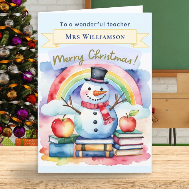 Söt akvarell snöman God Jul Lärare Helgkort (A Christmas card 'for a wonderful teacher' with snowman, apples, rainbow and customizable name)