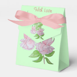 söt av gräddblommor i rosa vid av bröllop presentaskar