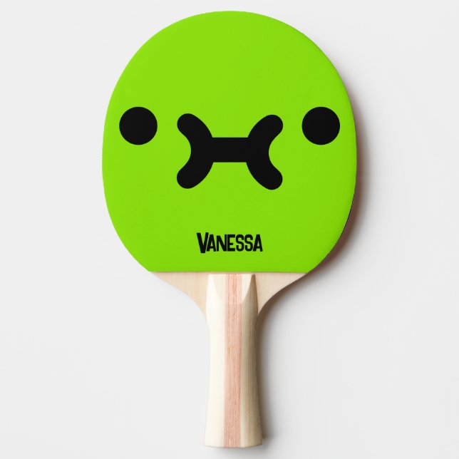 Söt, butterande grön ansikte med namn pingisracket (Framsidan)