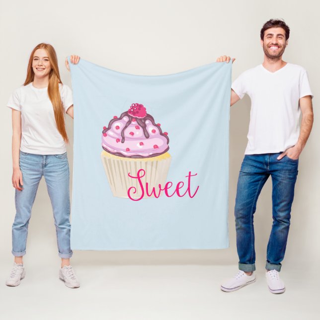 Söt cupkaka med hallon på ovansidan fleecefilt (På plats)