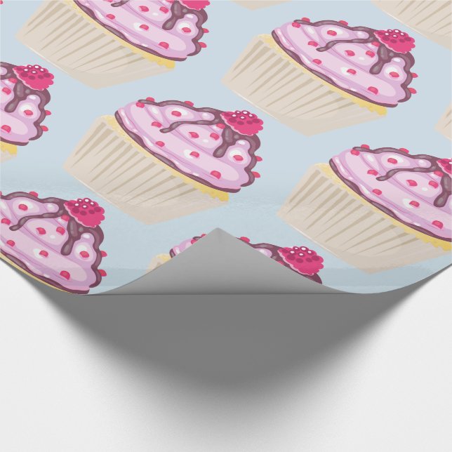 Söt cupkaka med hallon på ovansidan presentpapper (Hörn)