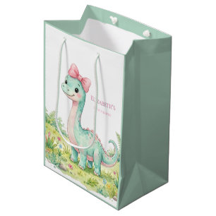 Söt dinosaurie med rosa rosett - baby shower