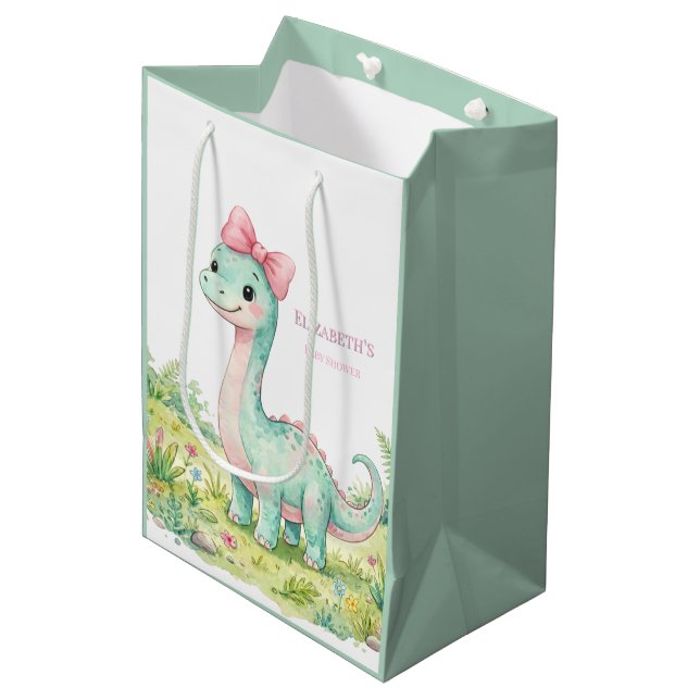 Söt dinosaurie med rosa rosett - baby shower (Framsidan Vinklad)