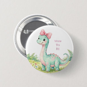 Söt dinosaurie med rosa rosett babyfirande blivand knapp