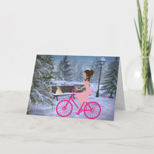 Söt flicka på en rosa cykel vinter kort