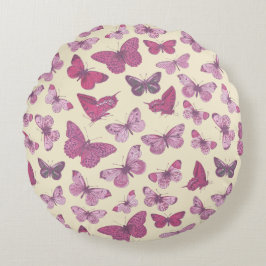 Söt flickaktig rosa fjärilsmönster på beige rund kudde