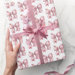 Söt flirtig rosa bågmönster presentpapper<br><div class="desc">Vattenfärg Rosa Rosett Presentpapper. Lägg till en touch av charm på dina presenter med detta söta och enkla presentpapper med ett rosa vattenfärgsrosett-mönster. Dess prickiga och söt design är perfekt för baby shower, bröllops shower eller födelsedagar - oavsett om det är för en liten flicka, en vuxen kvinna eller bara...</div>