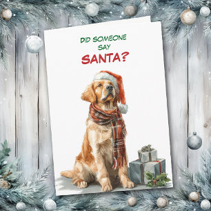 Söt Golden Retriever söker efter Tomte Helgkort