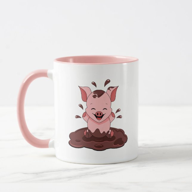 Söt gris som leker i lera mugg (Vänster)
