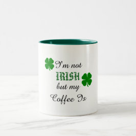 Söt grön och vit irländsk kaffemugg