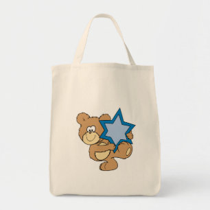 Söt hanukah-nalle som håller stjärnan vid davande tygkasse