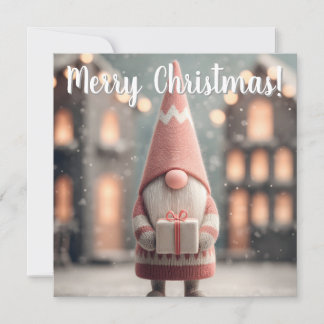 Söt julgnom som håller i en presentlåda julkort