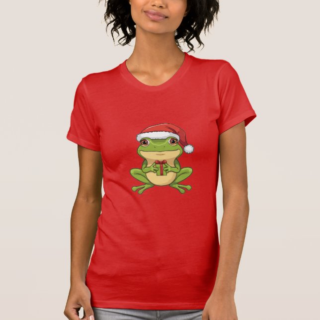Söt julgroda med jultomtehatt som håller present - t shirt (Framsida)