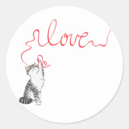 Söt katt med röd banderoll runt klistermärke