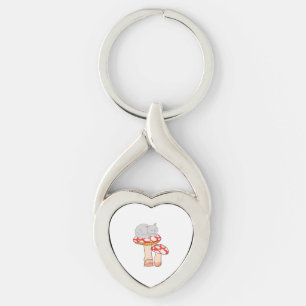 Söt katt som sover på svamp twisted heart silverfärgad nyckelring