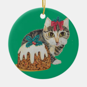 Söt kitten tabby katt som äter pudding på julkl julgransprydnad keramik