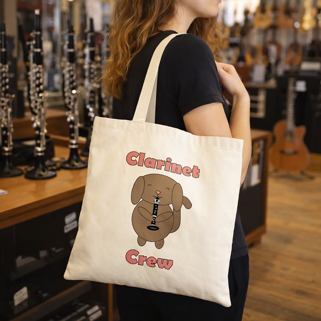 Söt Klarinettgäng Bruna Valp Hund Tygkasse (A tote bag with a cute dog playing the clarinet and the words clarinet crew.)