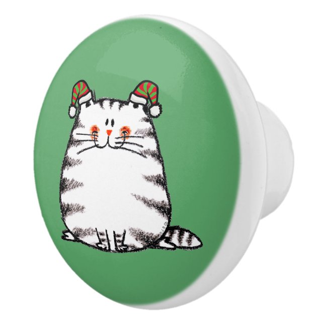 Söt knubbig katt med två julhattar knopp (Höger)