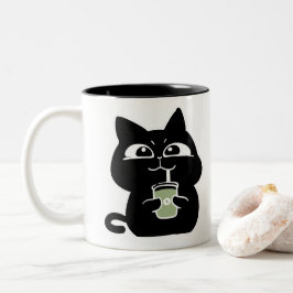 Söt knubbig svart katt kaffemugg