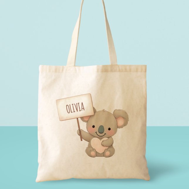 Söt koala som håller en namnskylt tygkasse (Skapare uppladdad)