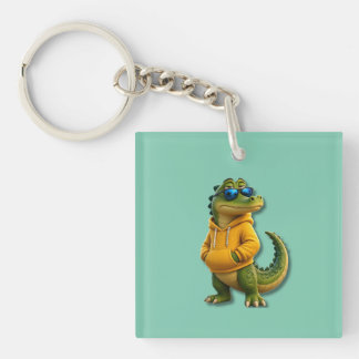 Söt krokodil i gul hoodie mintgrön nyckelring