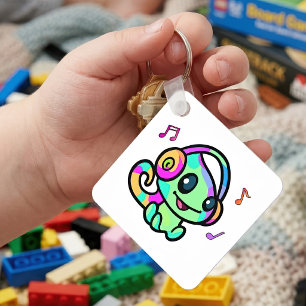 Söt leende Kawaii-babyckameleont med hörlurar Nyckelring