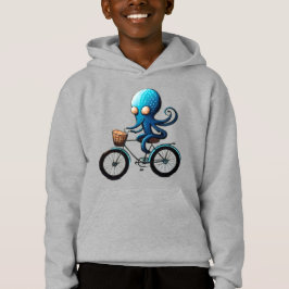 Söt liten blå bläckfisk på en cykel t shirt