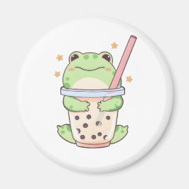 Söt liten groda som kramar om bubbelteacupen magnet